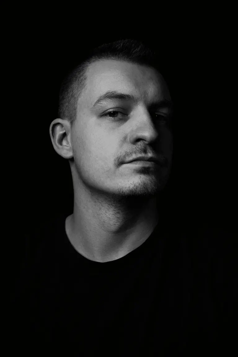 A low-key light photography of Daniel